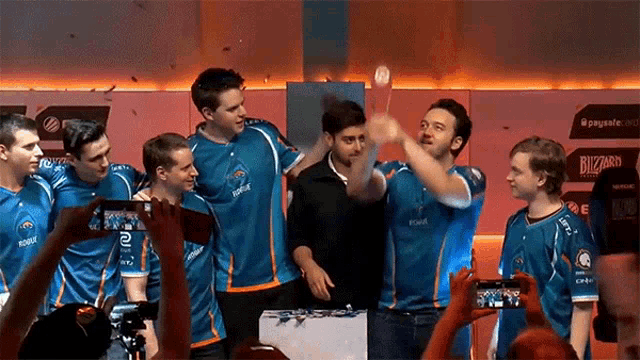 a group of young men wearing blue jerseys with the word blizzard on the front