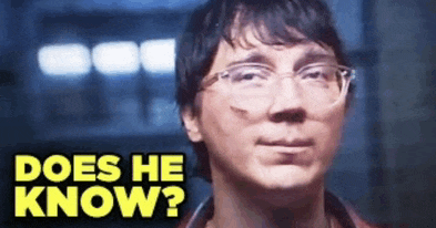 a close up of a man with glasses and the words does he know