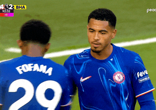 two soccer players with the number 29 on their shirts
