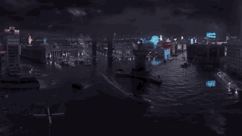 an aerial view of a city at night with a sign that says hybrid city