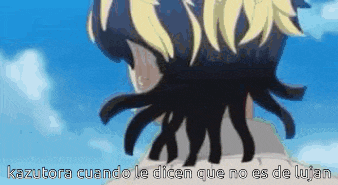 a close up of a person 's head with the words kazutora cuando le dicen que no es de lujan written on it