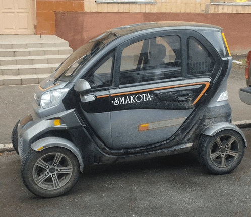 a small car that says smakota on the side