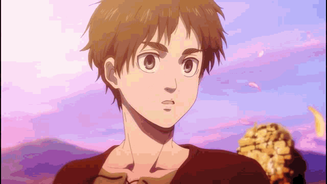 a young boy with brown hair and a purple sky in the background