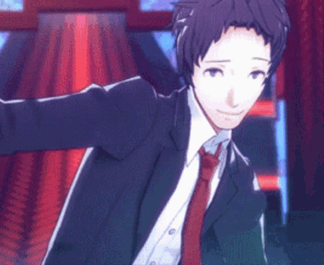a man in a suit and tie is standing in a room