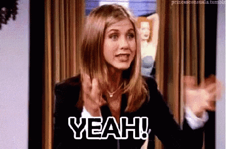 a woman is giving a thumbs up and saying yeah !