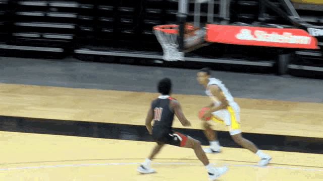 a basketball player with the number 18 on his back