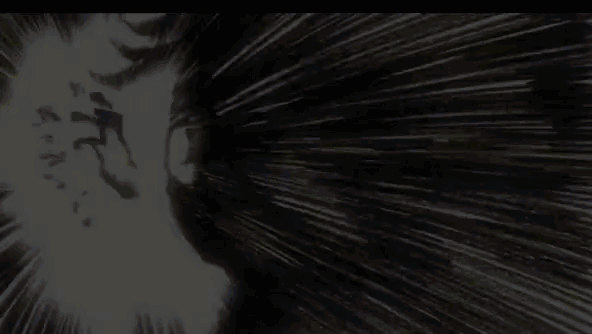 a close up of a person 's face with flames coming out of it 's mouth