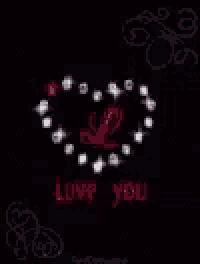 a black background with a heart surrounded by stars and the words love you