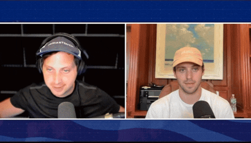 a man wearing headphones and a hat that says coast to coast