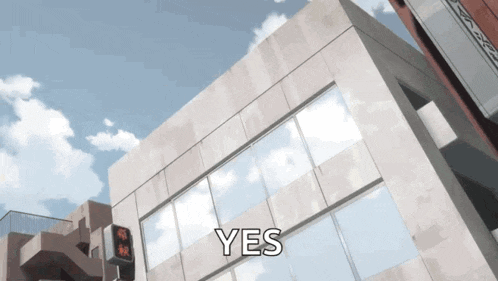 a large building with a sign that says yes on it