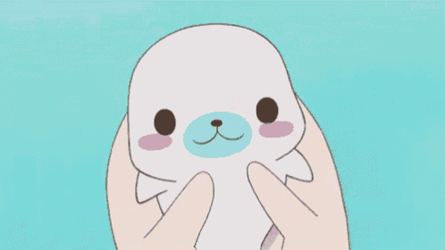 a person is touching a stuffed animal with their finger