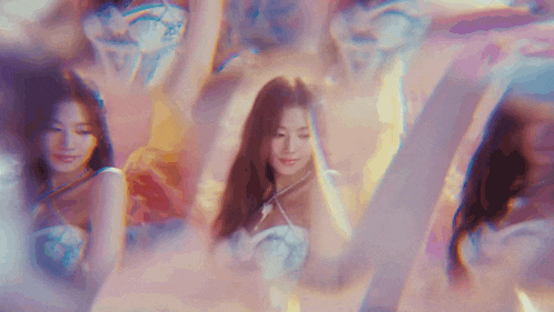 a woman in a white dress is surrounded by other women in a purple and pink background .