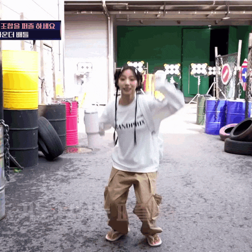 a girl wearing a white sweatshirt that says ' amanda ' on it