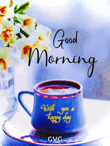 a blue cup of coffee with the words good morning wish you a happy day written on it