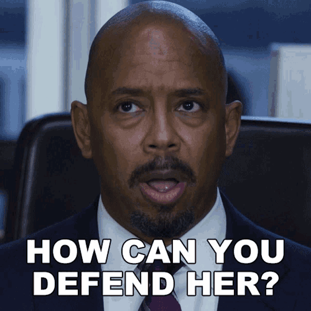 a bald man in a suit and tie is asking how can you defend her