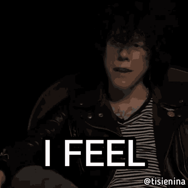 a man in a striped shirt and leather jacket says i feel