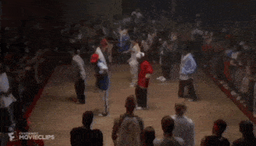 a group of people are dancing on the floor and the bottom of the screen says kangaroo movieclips