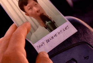 a person is holding a picture of a man with the words " do n't believe his lies " written on the bottom