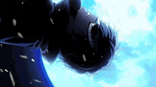 a person laying upside down with a blue sky behind them
