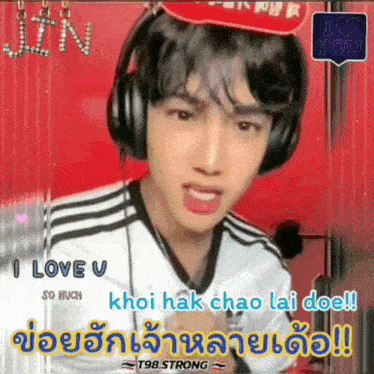 a young man wearing headphones and a hat .