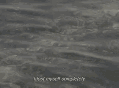 a close up of a body of water with the words `` i lost myself completely '' .