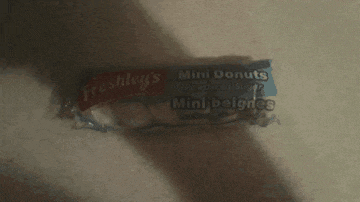 a package of freshley 's mini donuts is on a counter