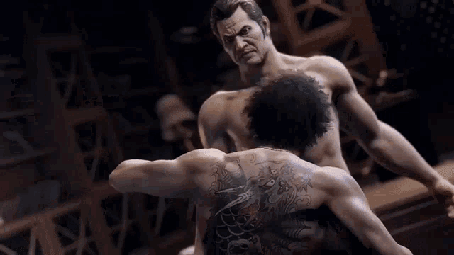 a man with a tattoo on his back is fighting another man in a video game .