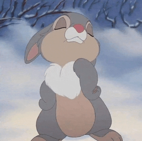 a cartoon rabbit is standing in the snow with its eyes closed and a sad look on its face .