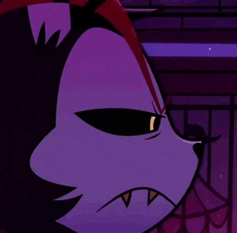 a close up of a cartoon character with red swirls coming out of it 's mouth .