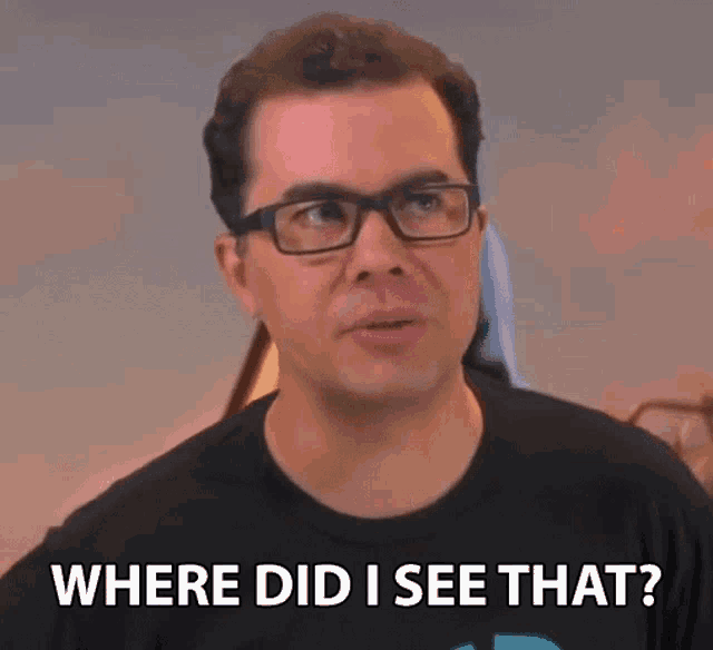 a man wearing glasses and a black shirt is asking where did i see that ?