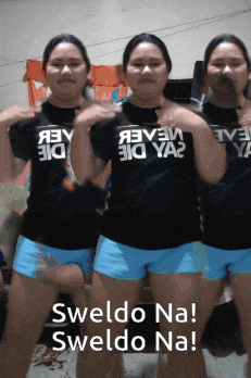 three women wearing black shirts and blue shorts are dancing with the words sweldo na sweldo na written below them