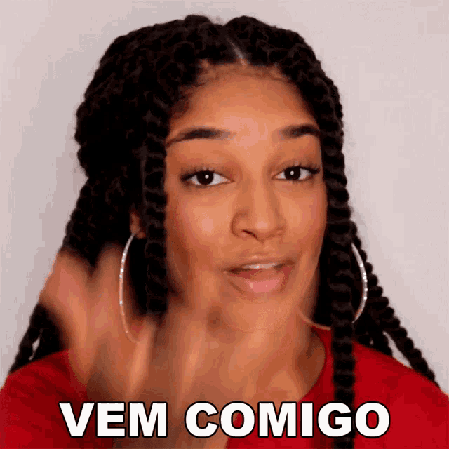 a woman with braids says vem comigo in white letters