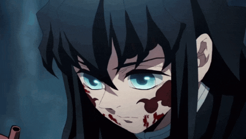 a close up of a person 's face with blue eyes