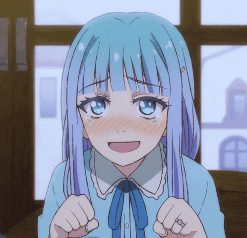 a girl with blue hair is making a face