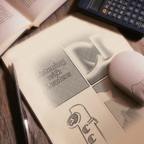 a book titled listening with leaders sits on a desk