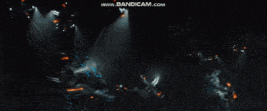 a person is holding a torch in a dark room with the website www.bandicam.com visible