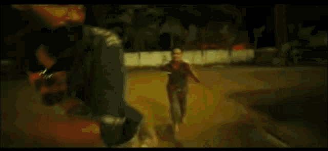 a man is carrying another man on his back in a blurry picture