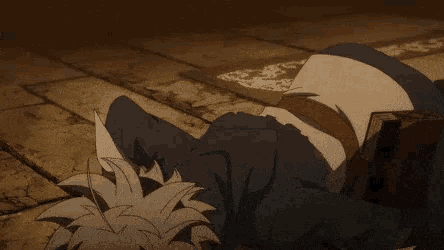 a cartoon character with horns is crawling on the ground with his mouth open