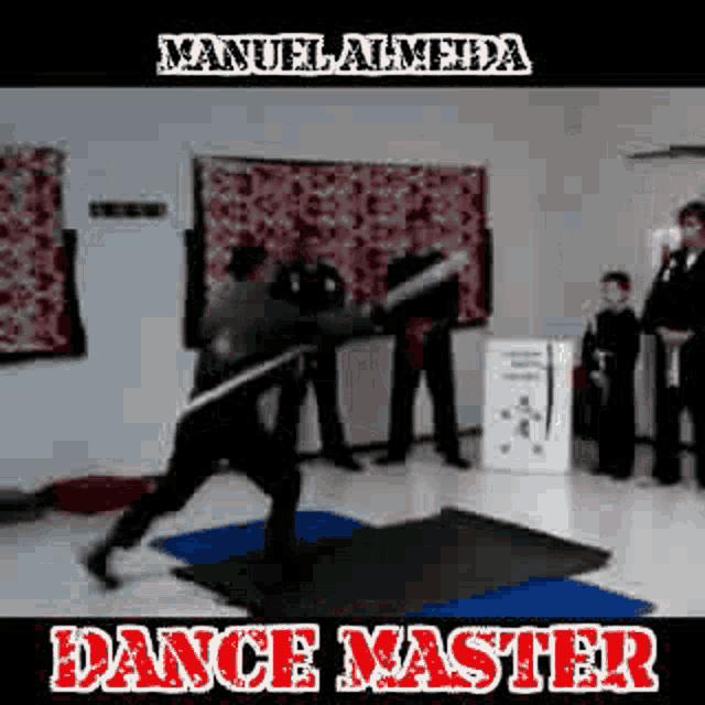 a man is holding a sword in his hand in a room .
