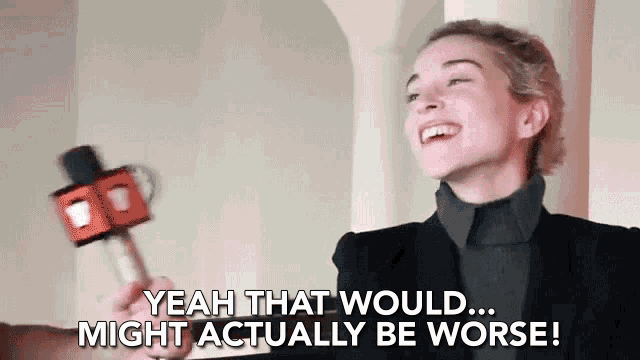 a woman is laughing while holding a microphone and says yeah that would might actually be worse .