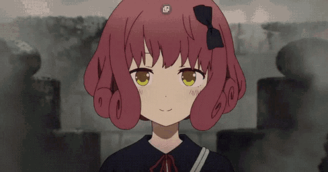 a girl with red hair and yellow eyes has a sticker on her head that says ' a ' on it