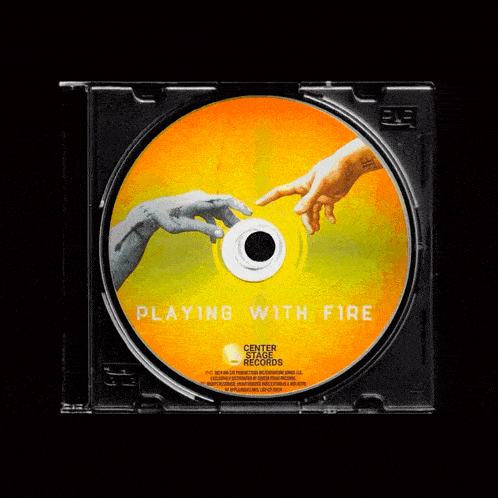 a cd that says playing with fire on the cover