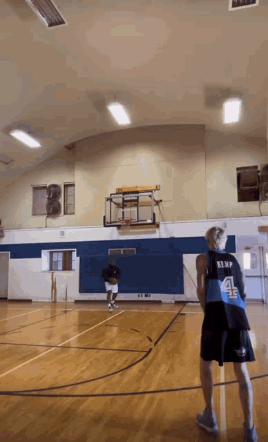 a basketball player with the number 4 on the back of his shirt