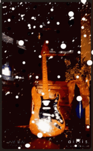 a picture of a guitar in the snow with the word dimis at the bottom