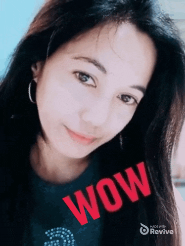 a woman is wearing a shirt that says wow