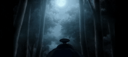 a person is walking through a dark forest with a full moon in the background
