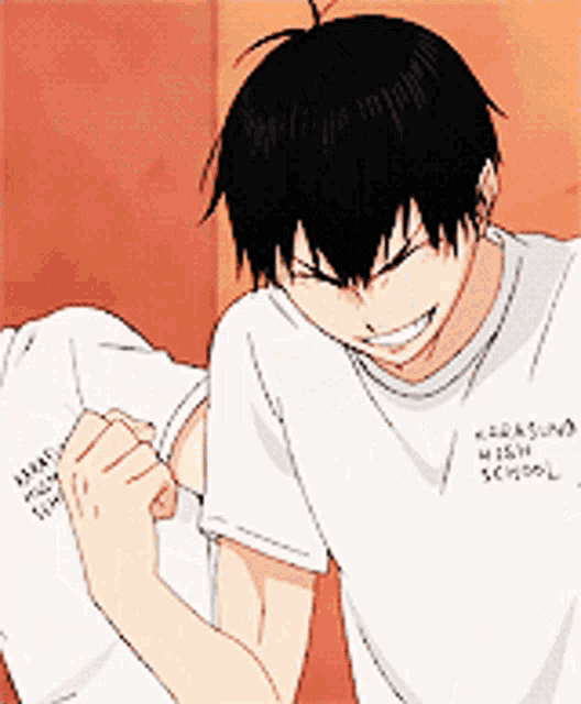 a man with black hair is wearing a white shirt that says karasuno high school on it