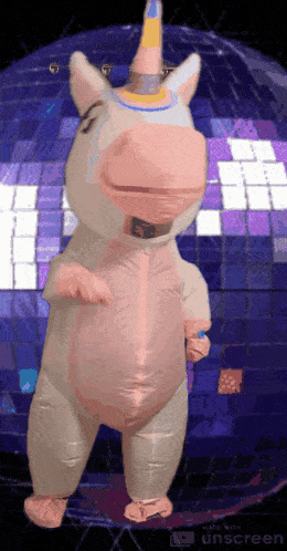 an inflatable unicorn is dancing in front of a disco ball made by unscreen