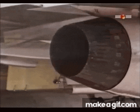 a close up of a jet engine on a jet .