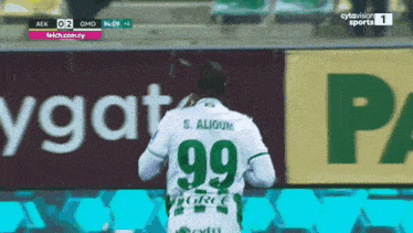 a soccer player with the number 99 on his shirt